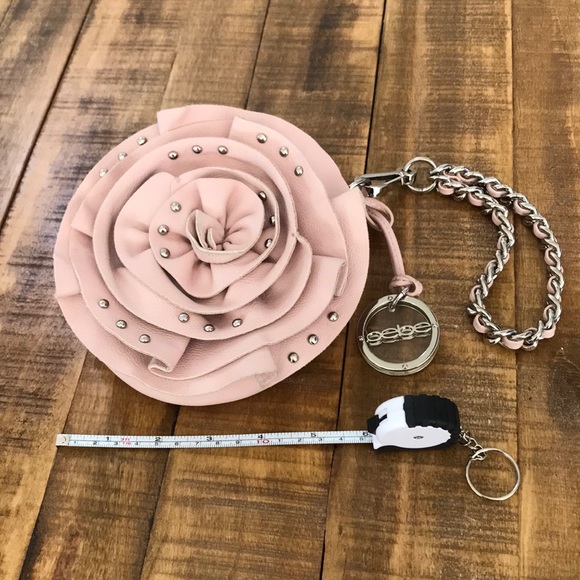 Bebe wristlet bag. Flower - Picture 1 of 8